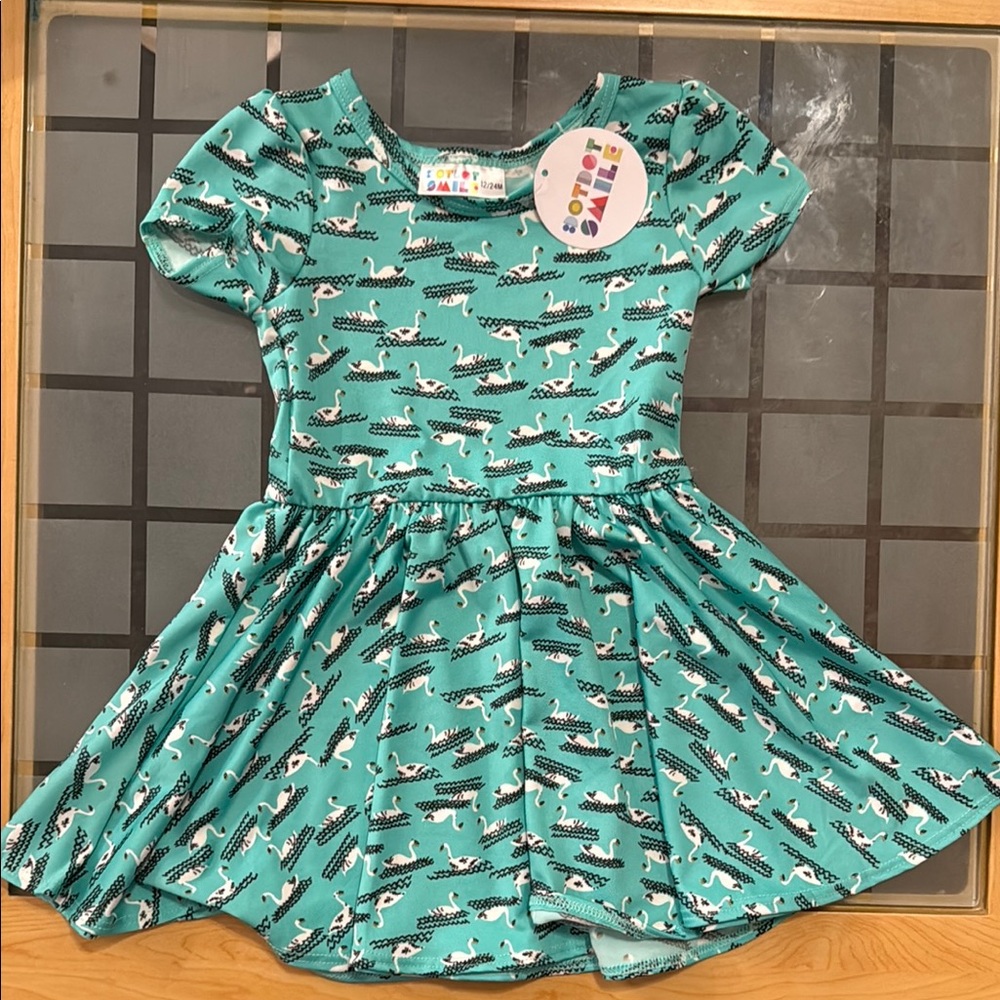 NWT. DotDotSmile dress size 12/24M.